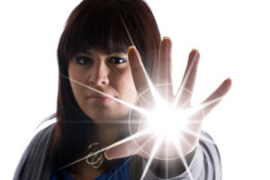 a woman with special powers shooting a burst of light or energy of some sort from the palm of her hand SKgenXd0Ss thumb