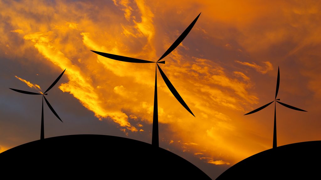 wind turbine silhouette sunset or sunrise economic system background Hw9glvkOnMg 1